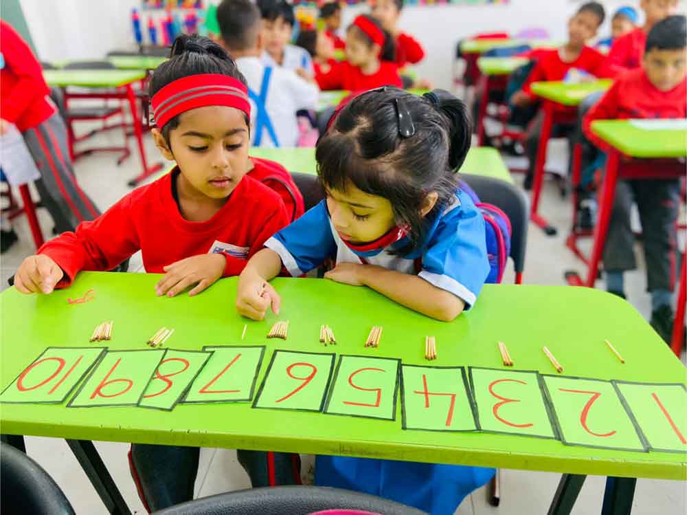 Children collaborating in a PATH active classroom environment